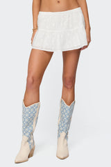 Dora Eyelet Flared Mini Skirt